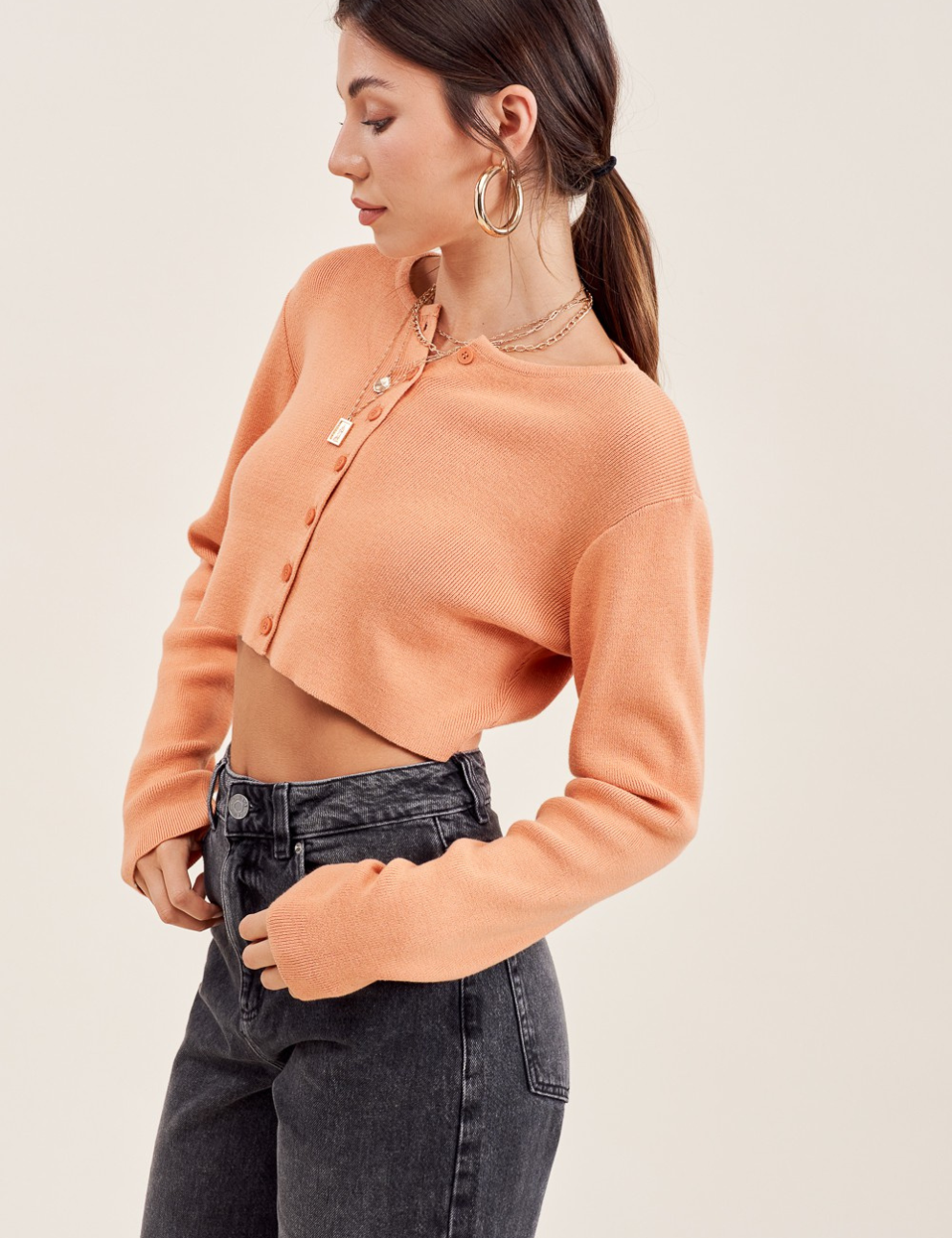 Kelly_Sweater_in_Pumpkin._f0fe61e0-4bbf-4047-8508-681c0e38b4cc.png