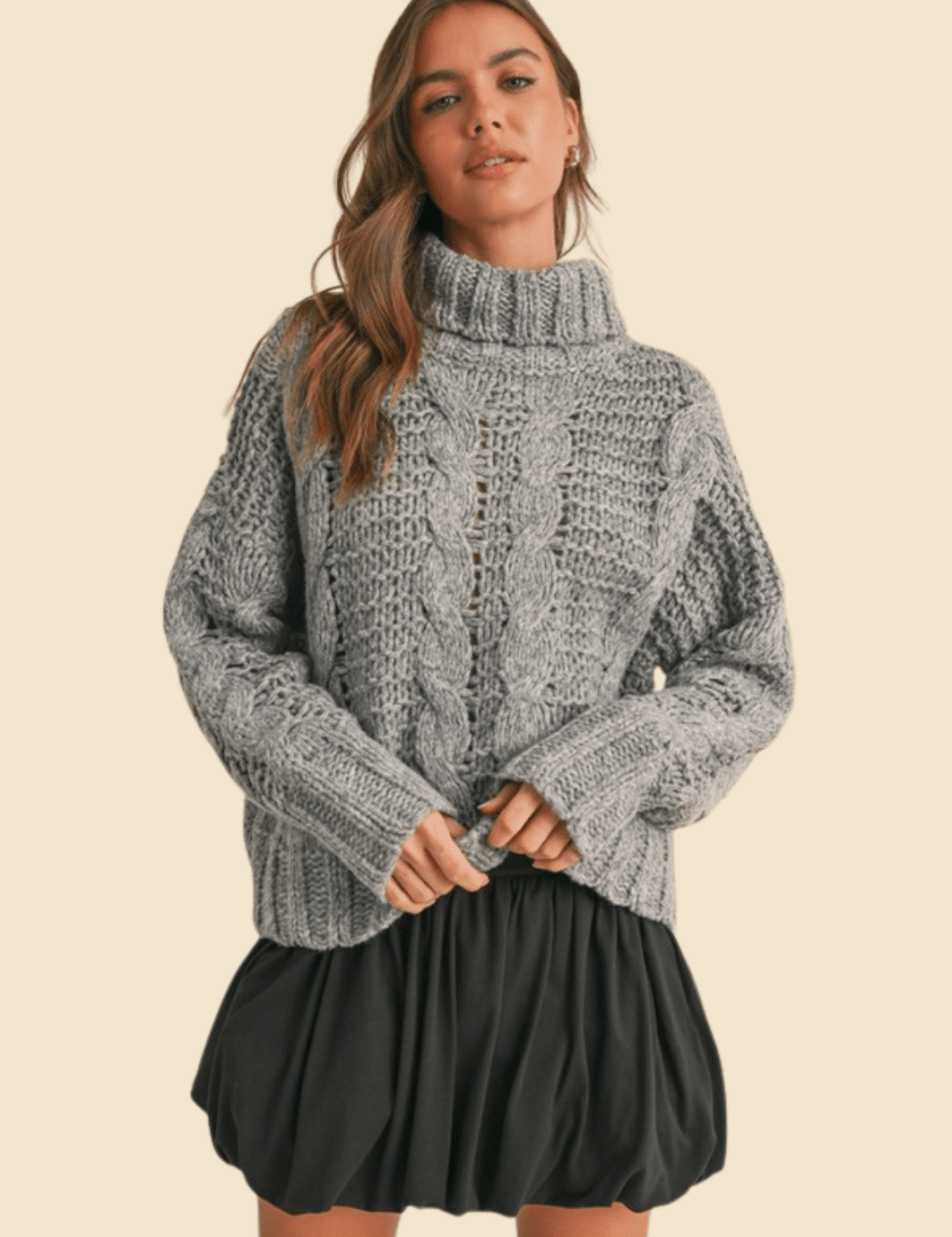 chunky-knit-turtle-neck-cable-sweater-2497281.png